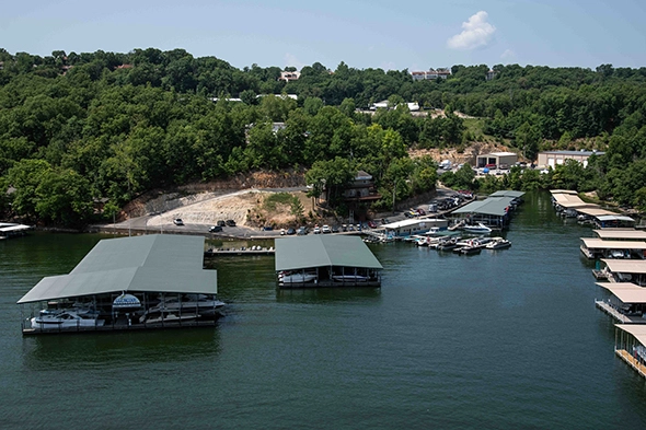 Aerial view of covered slips and shoreline at Glencove Marina